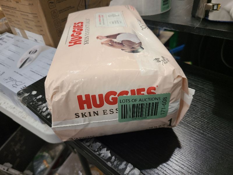 Photo 1 of Huggies Size 1 Diapers, Skin Essentials Baby Diapers, Size 1 (8-14 lbs), 32 Count, Packaging May Vary