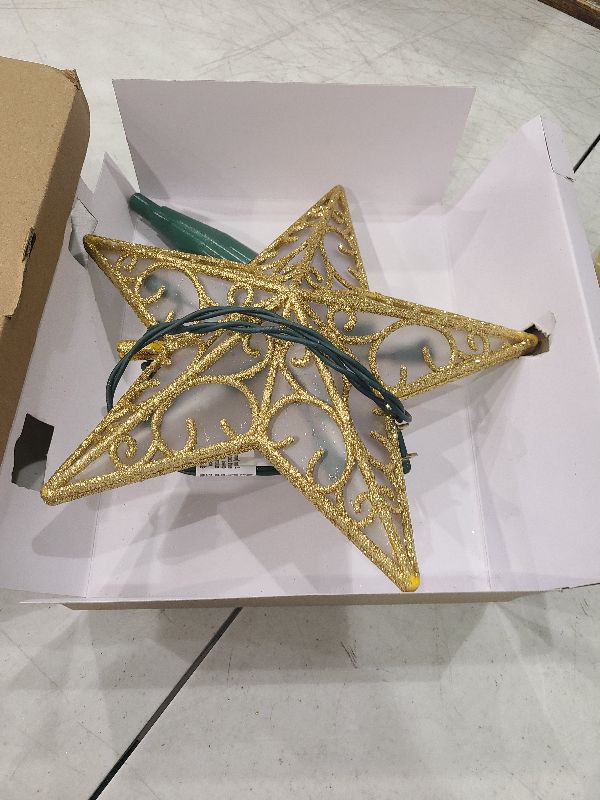Photo 1 of Christmas Star Tree Topper, 9.5 in Plug in Golden Glittered 3D Star Tree Topper, Metal Hollow Designed Built-in 10 Bulbs String Lights for Indoor Office Christmas New Year Holiday Tree Decoration
