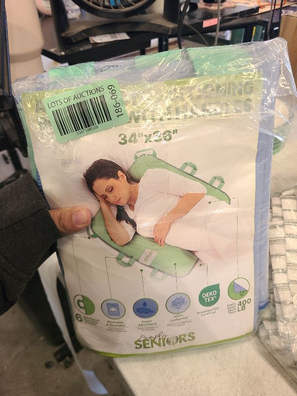 Photo 1 of Absorbent Positioning Bed Pad with Handles 34" X 36"- Washable, Waterproof Incontinence Bed Pads - Reusable Bed Mobility Under Pads to Aid Seniors, Disabled