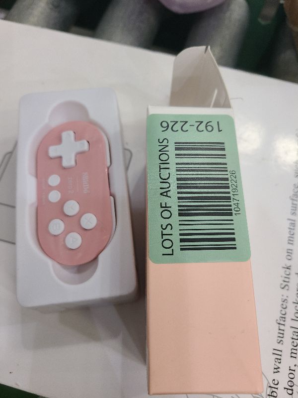 Photo 1 of 8Bitdo Zero 2 Bluetooth Key Chain Sized Mini Controller for Nintendo Switch, Windows, Android and macOS (Pink Edition)