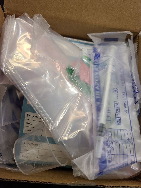 Photo 1 of 1mL Colostrum Syringes with Caps, Colostrum Collector Kit Include 50pcs 1mL Sterile Syringes for Colostrum, 1 Measuring Cup, 5 Storage Bags, Partial Set