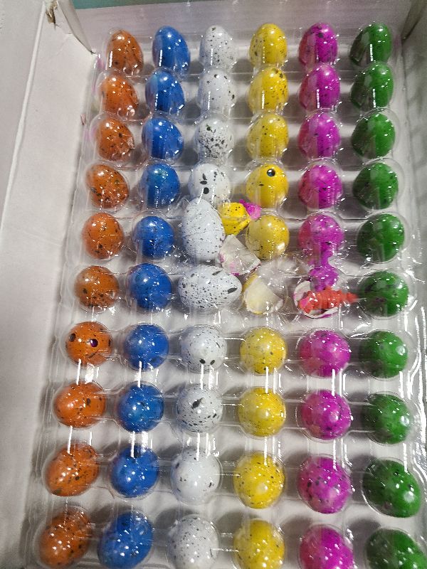 Photo 1 of 60PCS Small Hatching Dinosaur Eggs for Dinosaur Party Favors Birthday Goodie Treat Bag Stuffers Classroom Carnival Prizes Box Toys Bulk Pinata Fillers Novelty Grow in Water Dino Eggs with Toys Inside