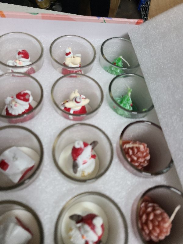Photo 1 of 12-Pack Christmas Glass Votive Candles - Festive Decor Set with Santa, Snowman, Pinecone, Cedar, Elk and House Designs - Good for Xmas Holiday Decorations, Parties and Gifts