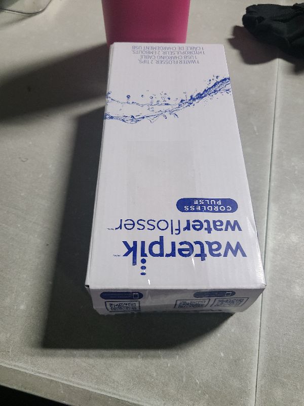 Photo 1 of Waterpik Cordless Pulse Rechargeable Portable Water Flosser for Teeth, Gums, Braces Care and Travel with 2 Flossing Tips, Waterproof, ADA Accepted, WF-20 Blue, Packaging May Vary