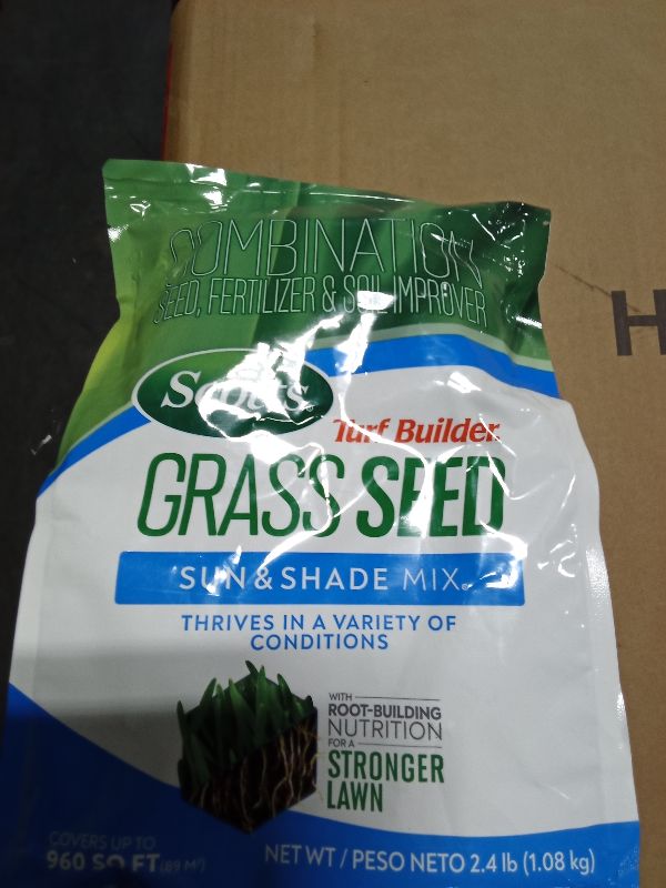 Photo 1 of  Scotts Turf Builder Grass Seed Sun & Shade Mix with Fertilizer and Soil Improver, Thrives in Many Conditions, 2.4 lbs. 