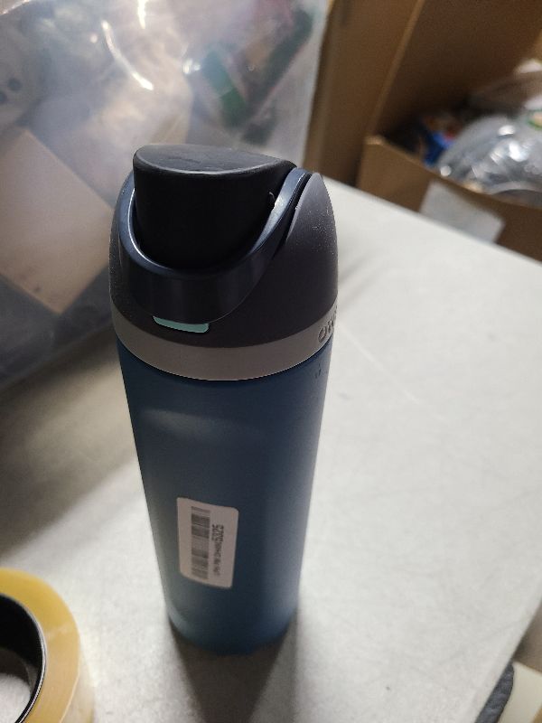 Photo 1 of Owala FreeSip Insulated Stainless Steel Water Bottle with Straw for Sports and Travel, BPA-Free, 24-oz, Blue/Teal (Denim)