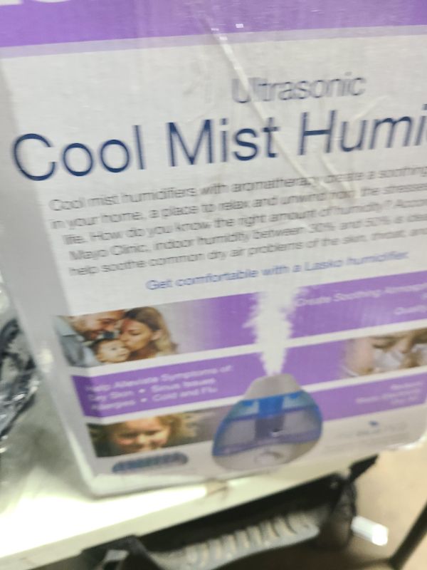 Photo 1 of Lasko 0.74 Gallon Cool Mist Ultrasonic Humidifier, 60-Hour Runt Time on Low, Covers 300 Sq. Ft., Essential Oil Tray, Filter Free for Bedrooms, Offices, Home, UH200