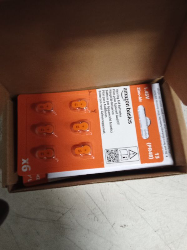 Photo 1 of Amazon Basics 60-Pack Hearing Aid Size 675 Zinc-Air Batteries, 1.45 Volt, Blue Tab, 4-Year Shelf Life, Child-Safe Package (Use Scissors to Open)