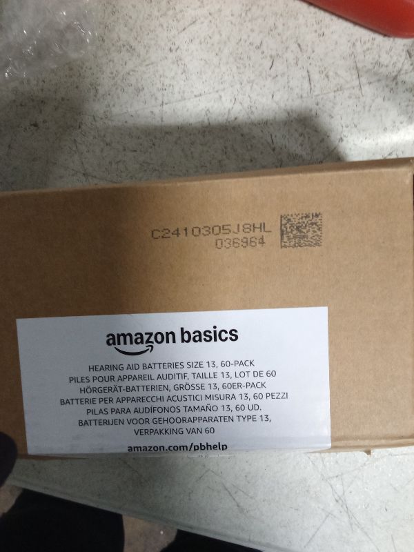 Photo 1 of Amazon Basics 60-Pack Hearing Aid Size 675 Zinc-Air Batteries, 1.45 Volt, Blue Tab, 4-Year Shelf Life, Child-Safe Package (Use Scissors to Open)