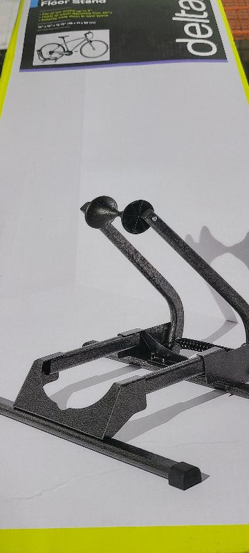 Photo 1 of  Adjustable Spring Floor Stand 
