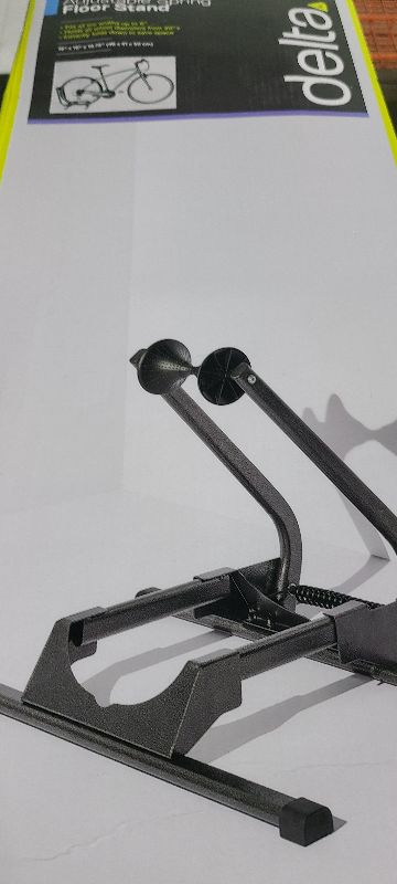 Photo 1 of  Adjustable Spring Floor Stand 