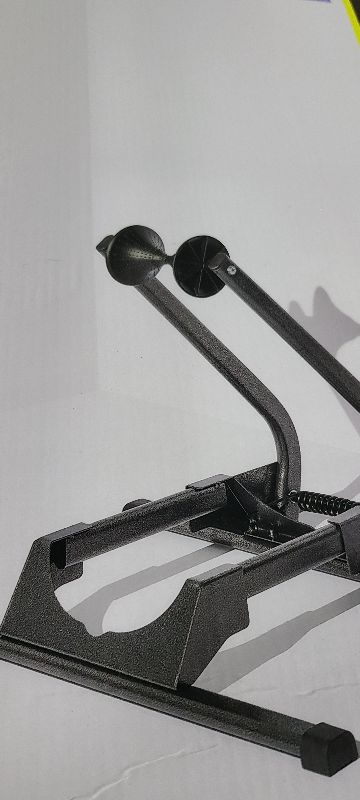 Photo 1 of  Adjustable Spring Floor Stand 