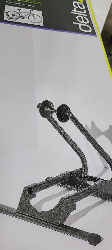 Photo 1 of  Adjustable Spring Floor Stand