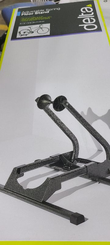 Photo 1 of  Adjustable Spring Floor Stand
