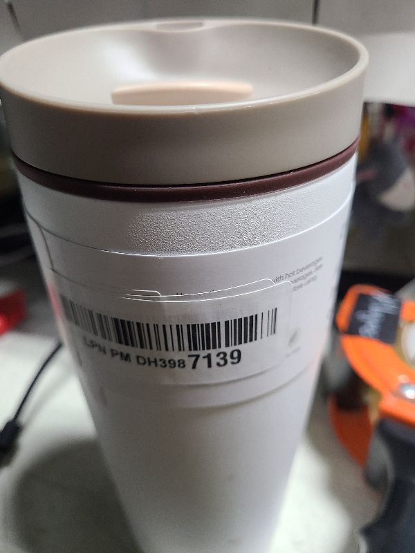 Photo 1 of Owala SmoothSip Slider Insulated Stainless Steel Coffee Tumbler, Reusable Iced Coffee Cup, Hot Coffee Travel Mug, BPA Free 20 oz, Tan/White (Vanilla Bean)