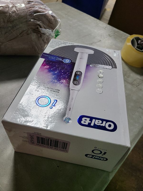 Photo 1 of Oral-B iO Series 8 Electric Toothbrush with 2 Replacement Brush Heads and Travel Case, Rechargeable Toothbrush, Whitealabaster
