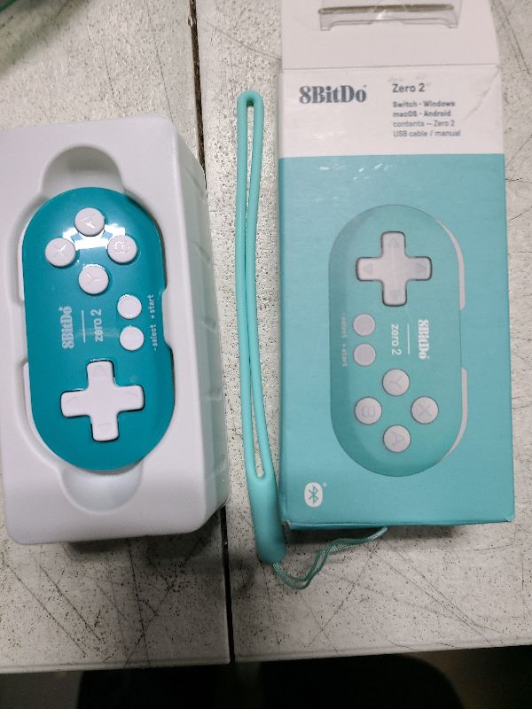 Photo 1 of 8Bitdo Zero 2 Bluetooth Gamepad Keychain Sized Mini Controller for Switch, Windows, Android, macOS & Raspberry Pi(Turquoise Edition)