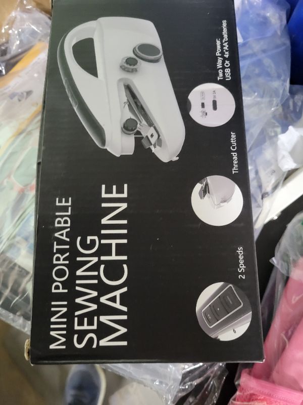 Photo 1 of Handheld sewing machine, portable, mini sewing machine, easy to use, fast sewing speed, suitable for sewing clothes, fabric, DIY Home machine for beginners(Pitch Black)