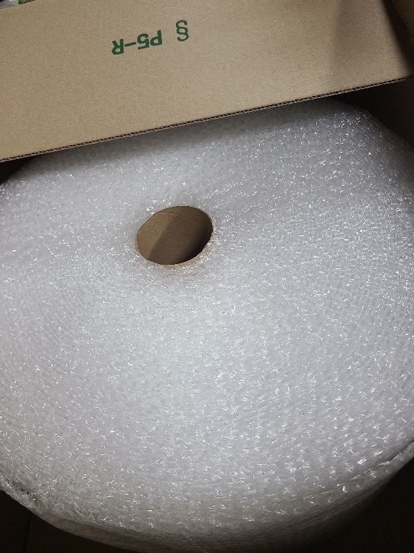 Photo 1 of Amazon Basics Perforated Bubble Cushioning Shipping Wrap, Small 3/16", 12 inch x 175 ft Long Roll, Clear
