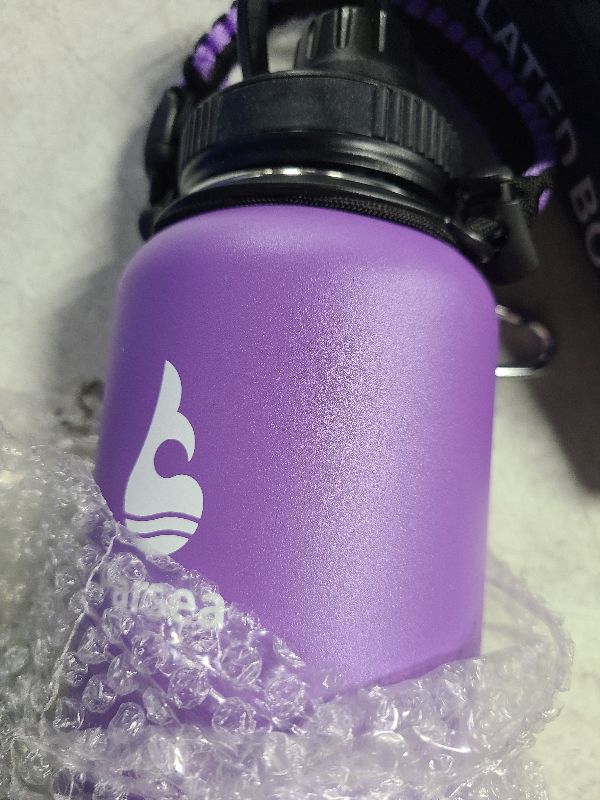 Photo 1 of Farsea Insulated Water Bottle With Paracord Handle, Protective Boot and 2 Lids (Straw Lid & Spout Lid), Stainless Steel Water Bottle Wide Mouth, Double Wall Sweat-Proof BPA-Free, 32 oz