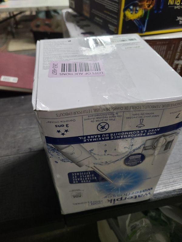 Photo 1 of Waterpik ION Professional Water Flosser, Rechargeable and Portable for Teeth, Gums, Braces, 10 Settings, 7 Flossing Tips For Multiple Users And Needs, ADA Accepted, WF-12 White, Packaging May Vary