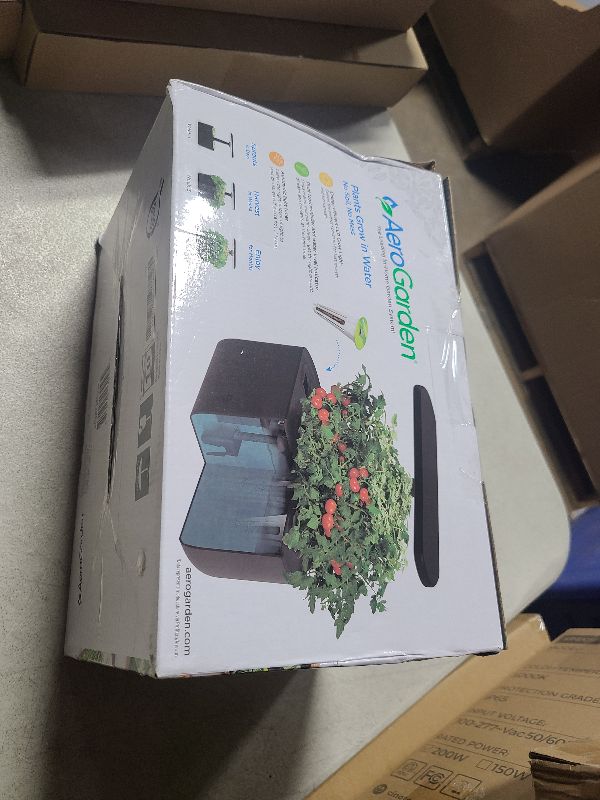 Photo 1 of AeroGarden Harvest 2.0, Indoor Garden Hydroponic System with LED Grow Light, Holds up to 6 AeroGarden Pods, Black