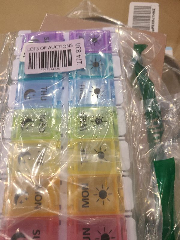 Photo 1 of Extra Large Weekly AM/PM Pill Organizer with Spring Open Design,7-Day Medicine Box with Push Button, Pill Planner with Rainbow Colores lids,Portable Pill Case and Large Compartment for Travel.