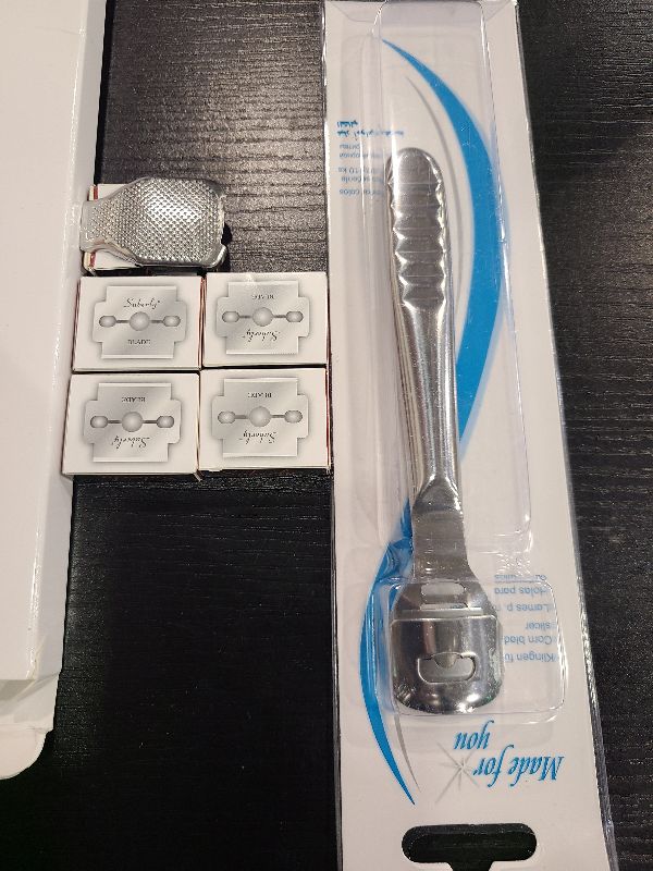 Photo 1 of 52 Pieces Callus Shaver Set, 50 Replacement Slices Blades 1 Stainless Steel Callus Shaver and 1 Foot File Head Foot Care Tools Hard Dry Skin Remover for Hand Feet