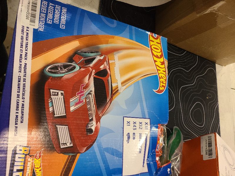 Photo 1 of Hot Wheels Toy Car Mega Track Set Pack, 87 Component Building Parts for 40-ft of Track & 1:64 Scale Vehicle (Amazon Exclusive)