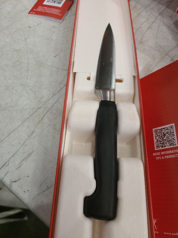 Photo 1 of Zwilling J.A. Henckels Twin Four Star 4-Inch High-Carbon Stainless-Steel Paring Knife