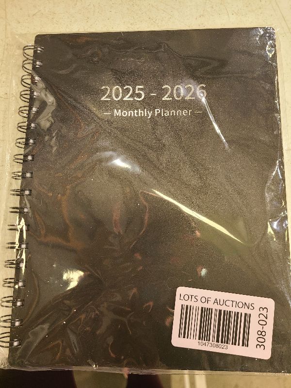 Photo 1 of Academic Planner 2025-2026 (7.4'' x 9.6''), 18 Months Calendar from Jan 2025-Jun 2026, Monthly Tabs & Pocket, Perfect for School & Work, 120GSM Thick Paper, Black