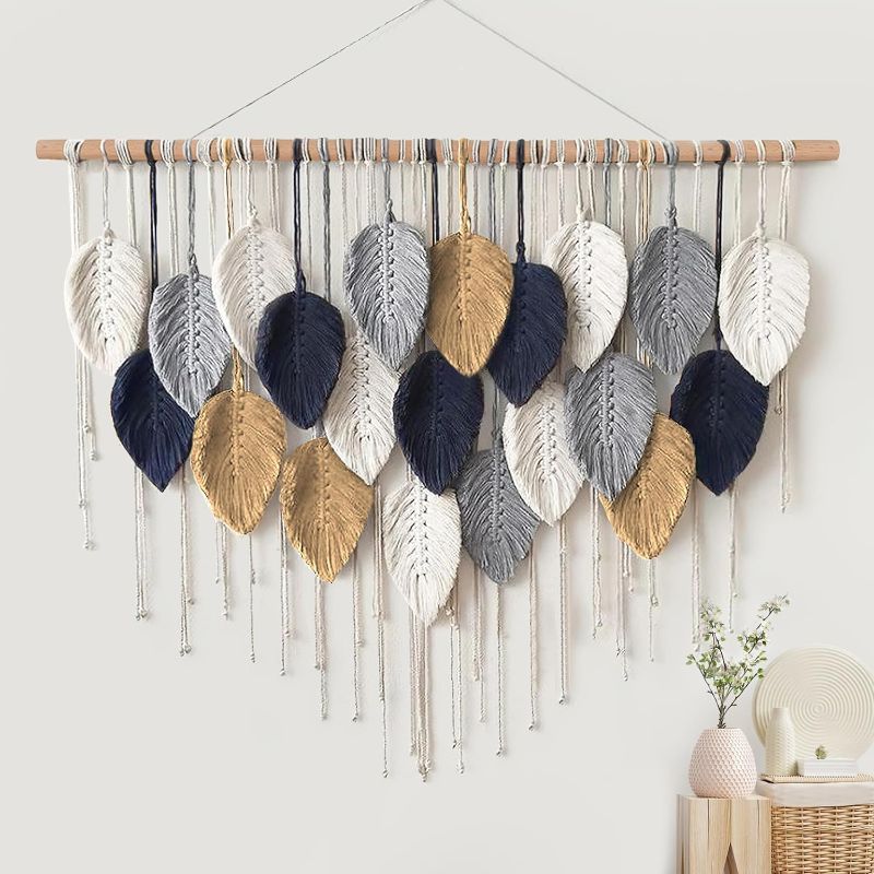 Photo 1 of  Alynsehom Large Macrame Wall Hanging, Boho Handmade Leaf Feather Bohemian Woven Tapestry, Chic Wall Art Home Decor for Bedroom Living Room Nursery Apartment Decorations(39" W x 29.5" L) 