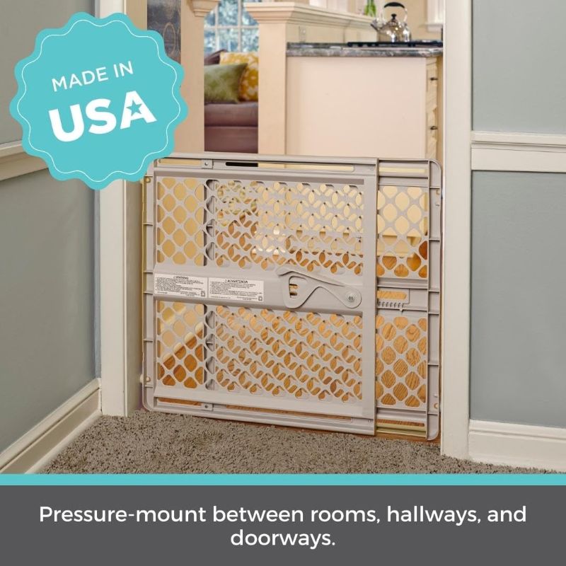Photo 1 of Toddleroo by North States Supergate Ergo Child Gate, Baby Gate for Stairs and Doorways. Includes Wall Cups. Pressure or Hardware Mount. Made in USA. (26" Tall, Sand) 