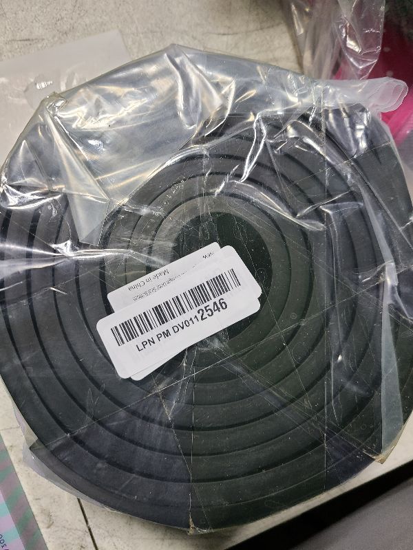 Photo 1 of Mejiao Garage Door Bottom Seal Garage Door Weather Stripping Black 10FT Garage Door Seal Bottom