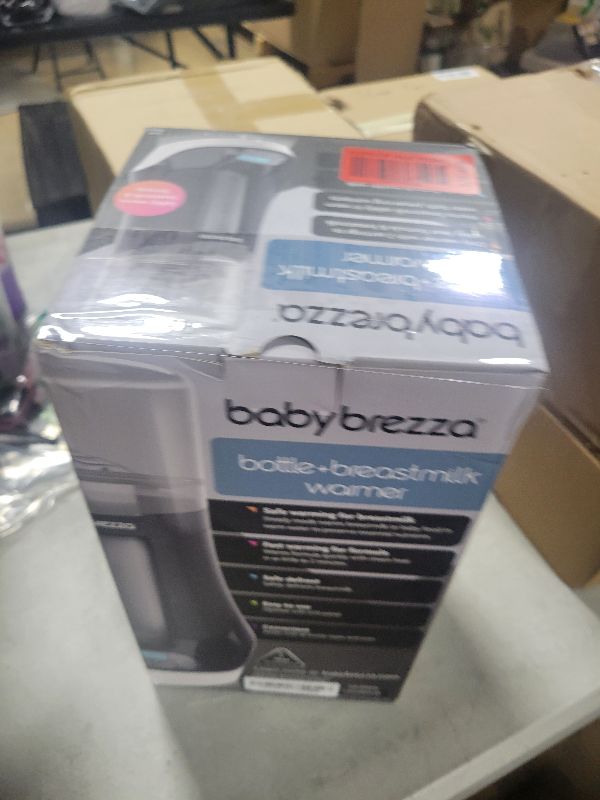 Photo 1 of Baby Brezza Electric Baby Bottle Warmer, Breastmilk Warmer + Defroster - Only Brand with Different Temperatures for Breastmilk + Formula - Universal Fit for All Baby Bottle Sizes + Breastmilk Bags