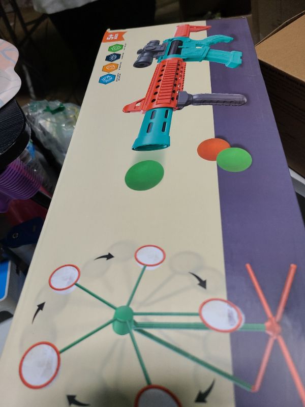Photo 1 of Shooting Games Toys for Age 5 6 7 8 9 10+ Year Old Boys, Kids Toy Sports & Outdoor Game with Moving Shooting Target & 2 Popper Air Toy Guns & 24 Foam Balls, Gifts for Boys and Girls