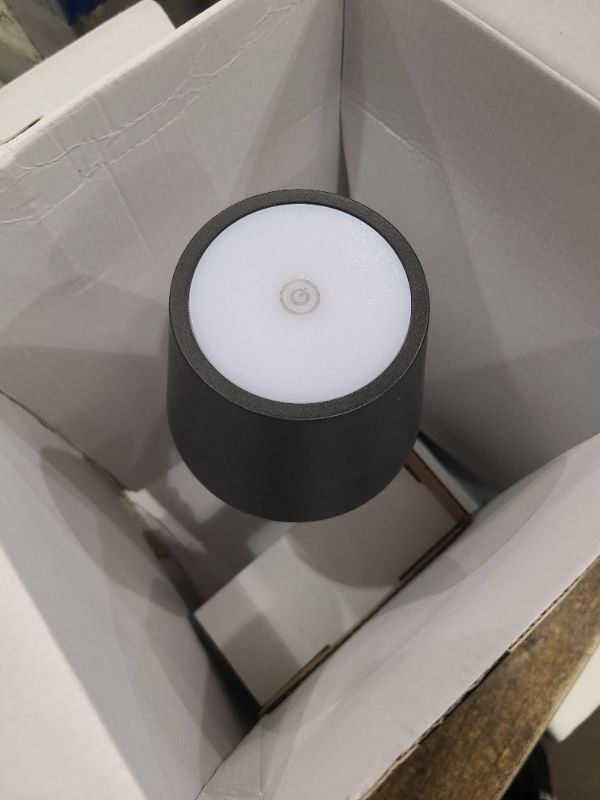 Photo 1 of Philips Hue Go Smart Portable Table Lamp, Black - White and Color Ambiance LED Color-Changing Light - 1 Pack - Indoor and Outdoor Use - Control with Hue App or Voice Assistant