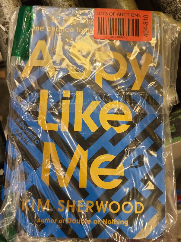 Photo 1 of A Spy Like Me: Six days. Three agents. One chance to find James Bond. (Double O, 2) Hardcover – April 23, 2024