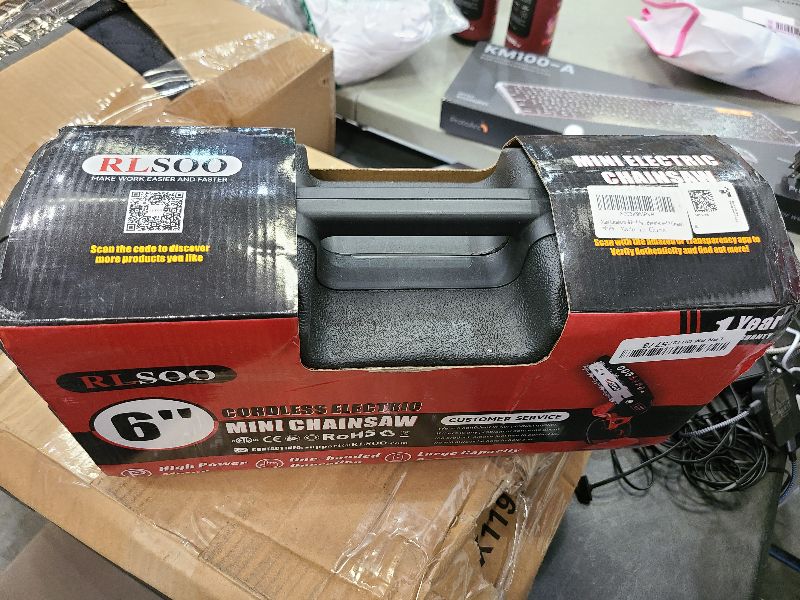Photo 1 of Mini Chainsaw, 6 Inch Mini Chainsaw Cordless, 2024 Upgraded Portable Handheld Small Chain saw for Wood Cutting, Tree Trimming, Courtyard, Household, and Garden (Includes 2 Batteries and 3 Chains)