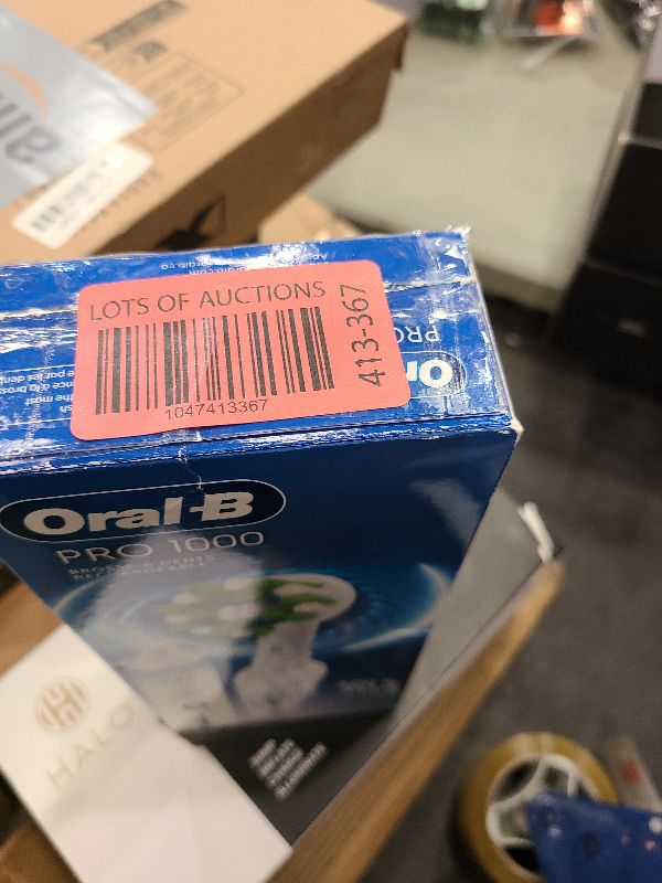 Photo 1 of Oral-B Pro 1000 Rechargeable Electric Toothbrush, White