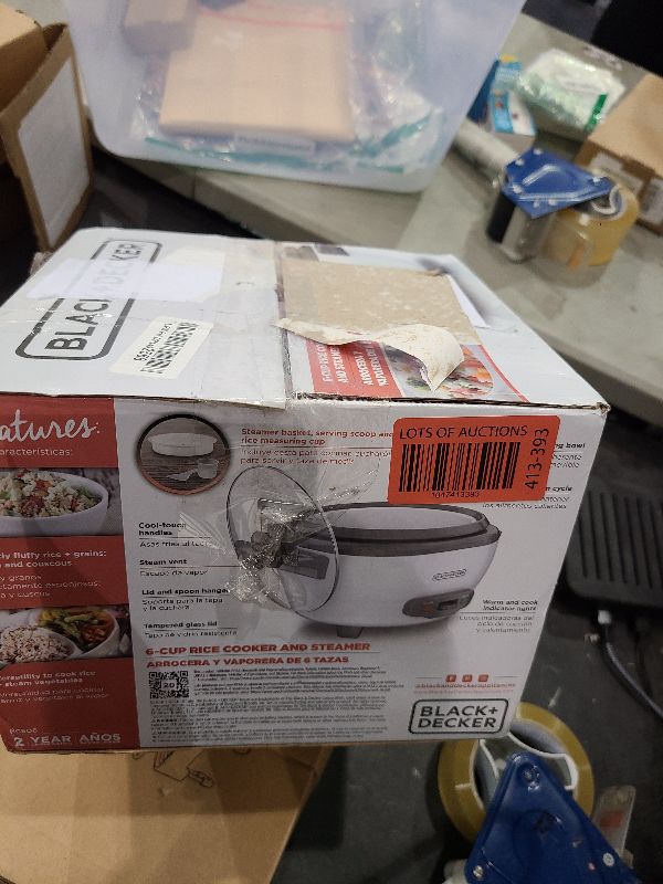 Photo 1 of BLACK+DECKER 6-Cup Rice Cooker, RC506, 3-cup Uncooked Rice, Steaming Basket, Removable Non-Stick Bowl, One Touch