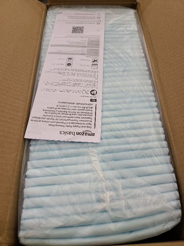 Photo 1 of Amazon Basics Leakproof Dog and Puppy Pee Pads with 5-Layer Quick-Dry Surface for Potty Training, Standard Absorbency, Giant, 27.5 x 44 Inch, Pack of 40, Blue & White