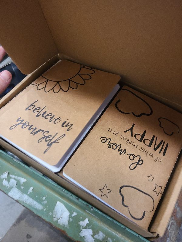 Photo 1 of 24 Pack Let's Be Happy Notebooks Bulk, Lined Happy Themed Journals for Kids Coworkers, Office Employee Gifts, Kraft Paper Material, School Supplies (80 Lined Page, 4 x 5.75 In)
