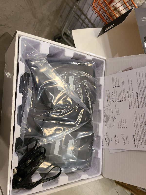 Photo 1 of NETGEAR Nighthawk Tri-Band WiFi 6E Router (RAXE300) - Security Features, AXE7800 Wireless Gigabit Speed (Up to 7.8Gbps), New 6GHz Band, 8-Streams Cover up to 2,500 sq. ft., 40 Devices