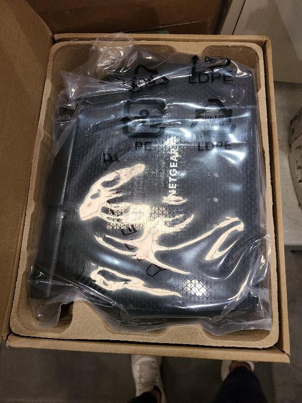 Photo 1 of NETGEAR 4-Stream WiFi 6 Router (R6700AX) – Security Features, AX1800 Wireless Speed (Up to 1.8 Gbps), Covers up to 1,500 sq. ft., 20 devices