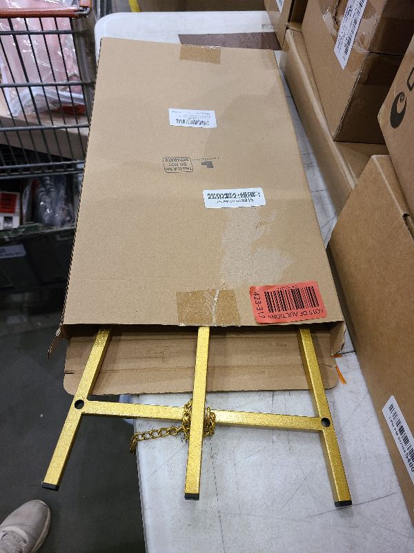 Photo 1 of Leinuosen Metal Easel Stand 16.5" H x 8.7" W x 4.3" D Table Top Easel Stand for Display Tripod Art Picture Mirror Modern Plate Holder for Display Book Photo Wedding Sign(Gold)
