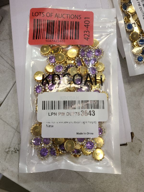Photo 1 of 100 Pcs 12MM Sew on Rhinestones Crystals Glass Metal Base Sewing Flower Claw Rhinestones for Clothes Shoes Earring Belt Crafts Sewing Accessories (07 Light Purple)