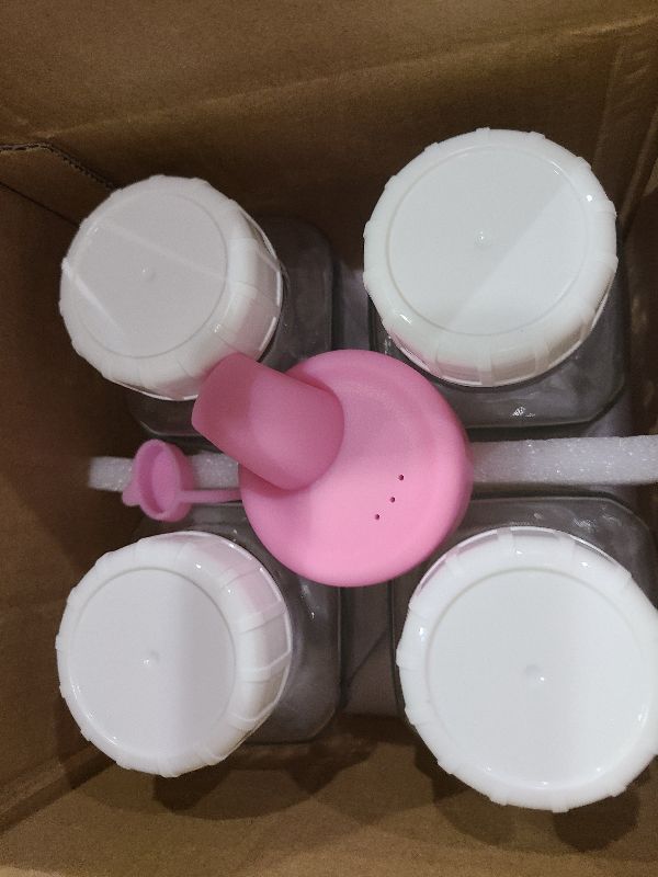 Photo 1 of 4 Pack 16 Oz Square Glass Milk Bottle with A Silicone Dispenser Cap, Glass Juice Bottles with Airtight Screw Lid, Reusable Drinking Bottles with Capacity Marks, Breastmilk Storage Container