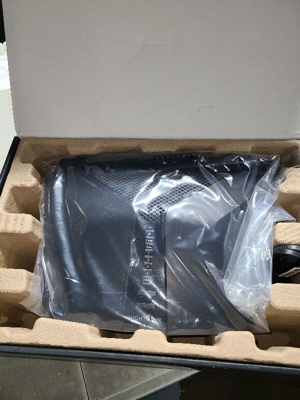 Photo 1 of NETGEAR Nighthawk 6-Stream Dual-Band WiFi 6 Router (RAX54S) – Security Features, AX5400 Wireless Speed, Up to 5.4 Gbps, Covers up to 2,500 sq. ft., 25 Devices - 1-Year Armor Subscription Included