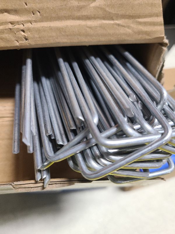 Photo 1 of AMAGABELI GARDEN & HOME 50 Pack Galvanized Landscape Staples 12 Inch 11 Gauge Garden Staples Garden Stakes Plant Cover Stakes U-Shaped Landscape Stakes Landscape Pins for Weed Barrier Fabric